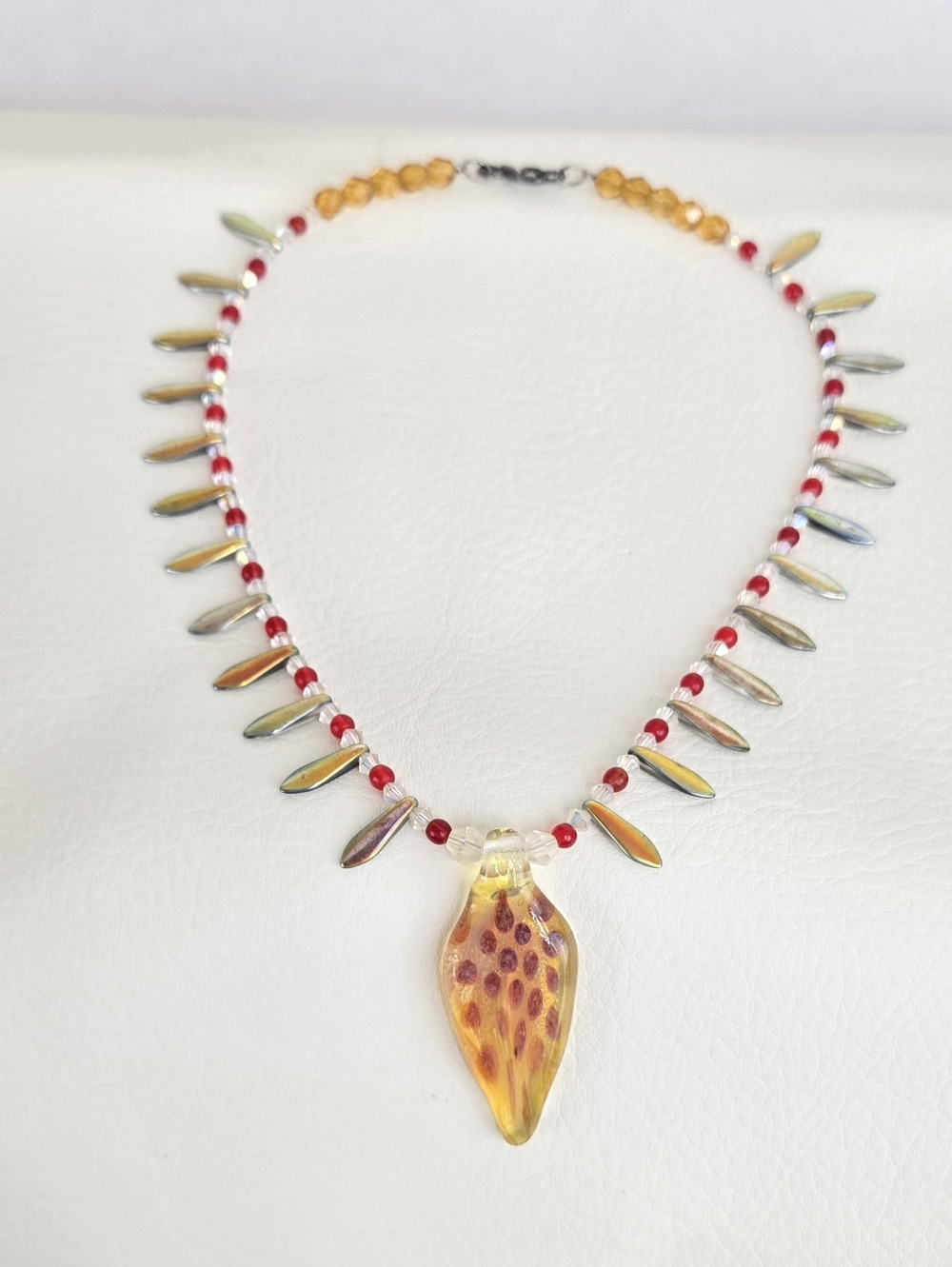 Handmade Amber Glass Pendant Necklace with Red Beads And Irradescent Drops